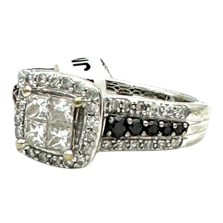 14 karat white gold, 1.25 Carat halo, black, and white diamond ring