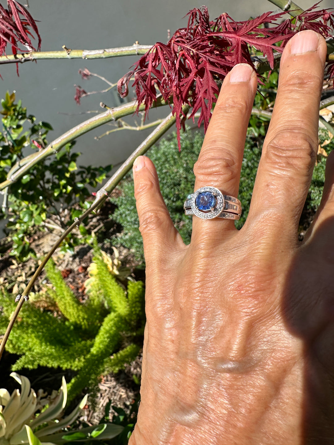 14 Karat White Gold 2.25TCW Blue Sapphire Halo Diamond and Baguette Ring