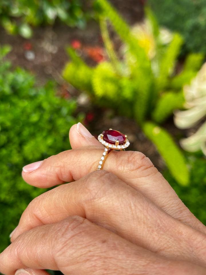 14 karat 3.93 carat red ruby halo ring