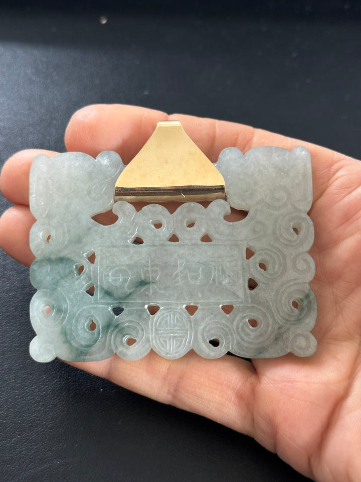 ￼ Lucky 14 karat 91.54 g carved green Jadeite pendant