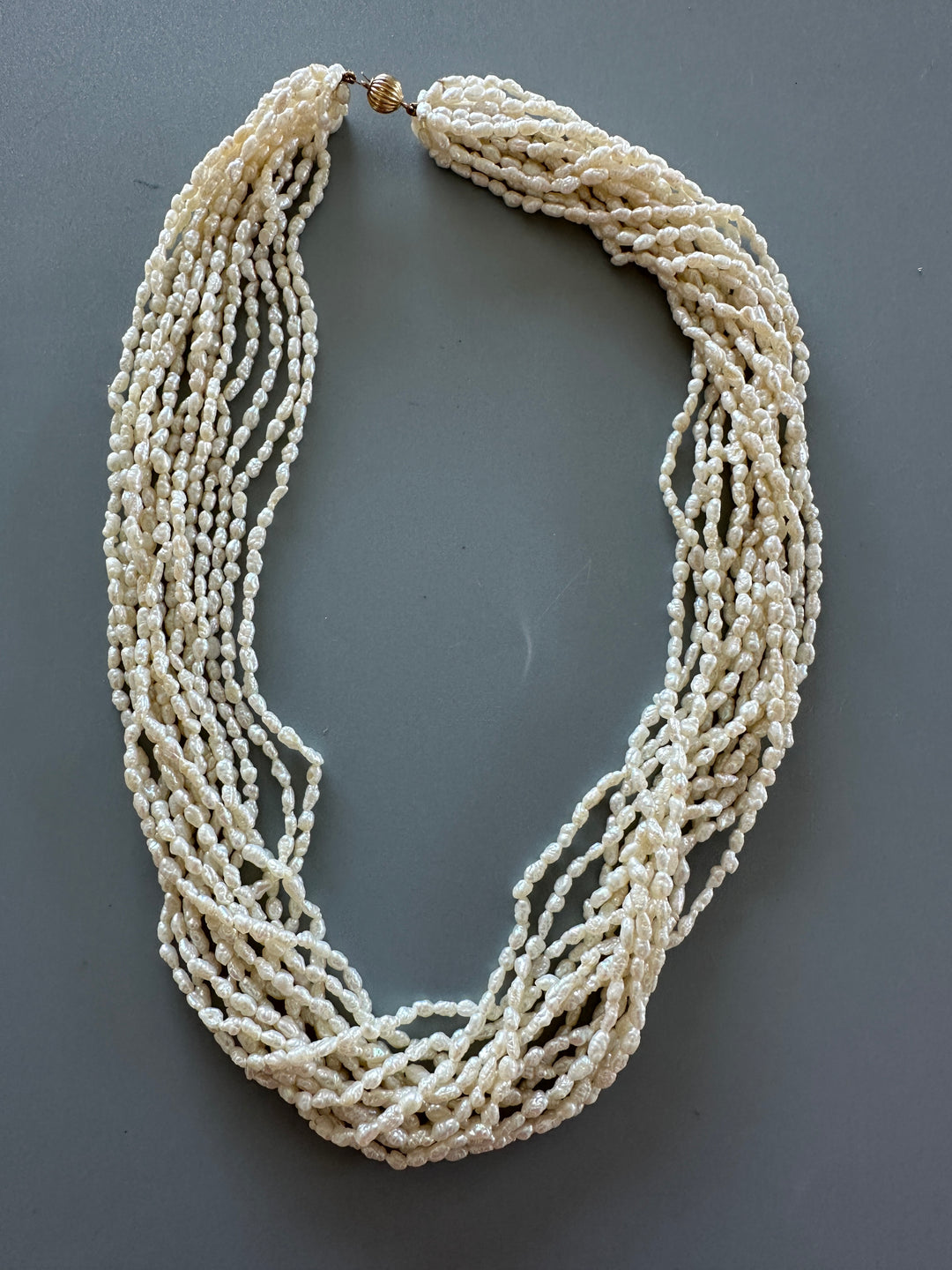 14 karat yellow gold multi strand 18 inch pearl necklace