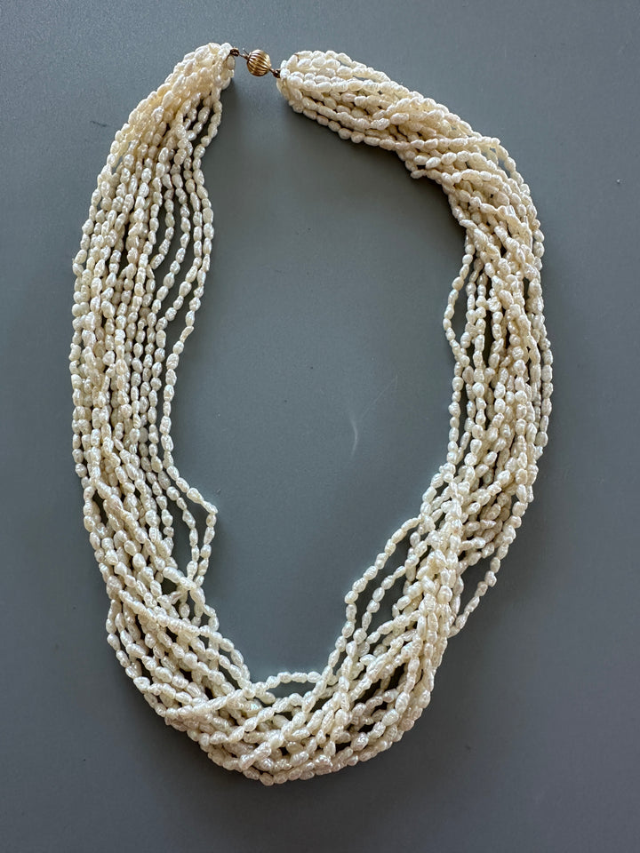 14 karat yellow gold multi strand 18 inch pearl necklace