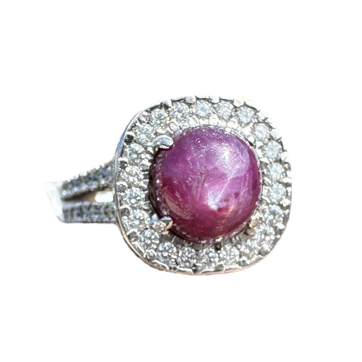 18 karat white gold star ruby halo diamond ring