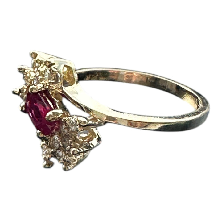 14 karat yellow gold, ruby, and diamond ring