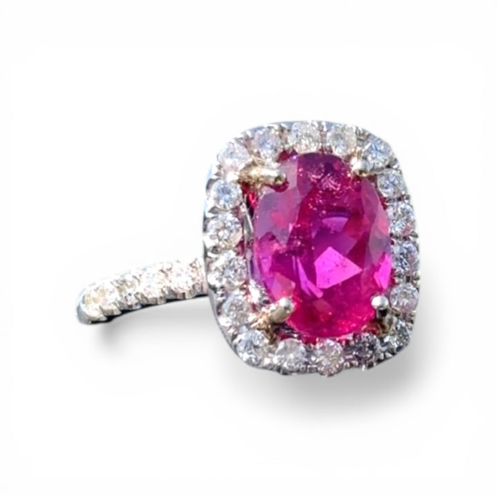 18 karat white gold, 6 carat pink tourmaline and diamond halo ring