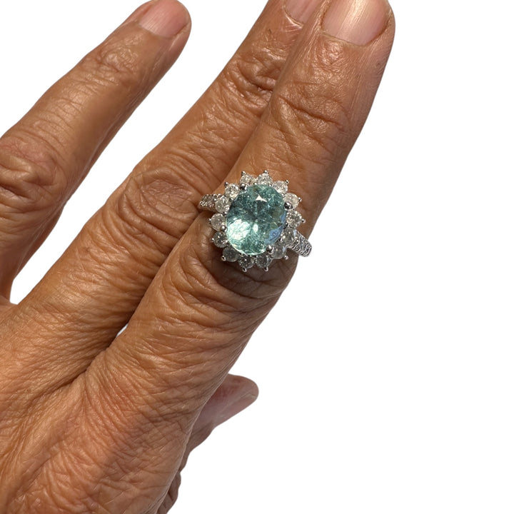 14 karat white gold neon 4.50 Carat Paraiba Tourmaline halo diamond ring