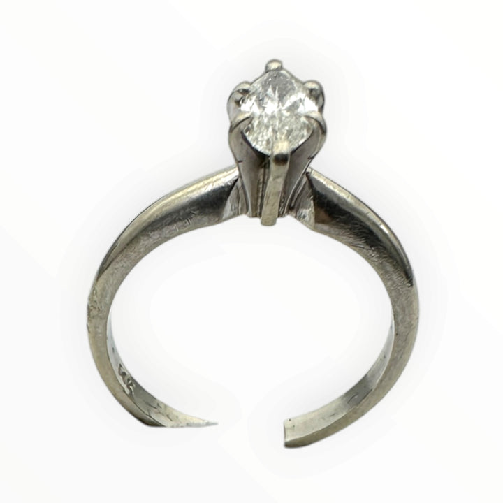 Classic .41 carat marquise–shaped diamond solitaire ring in 14 karat white gold