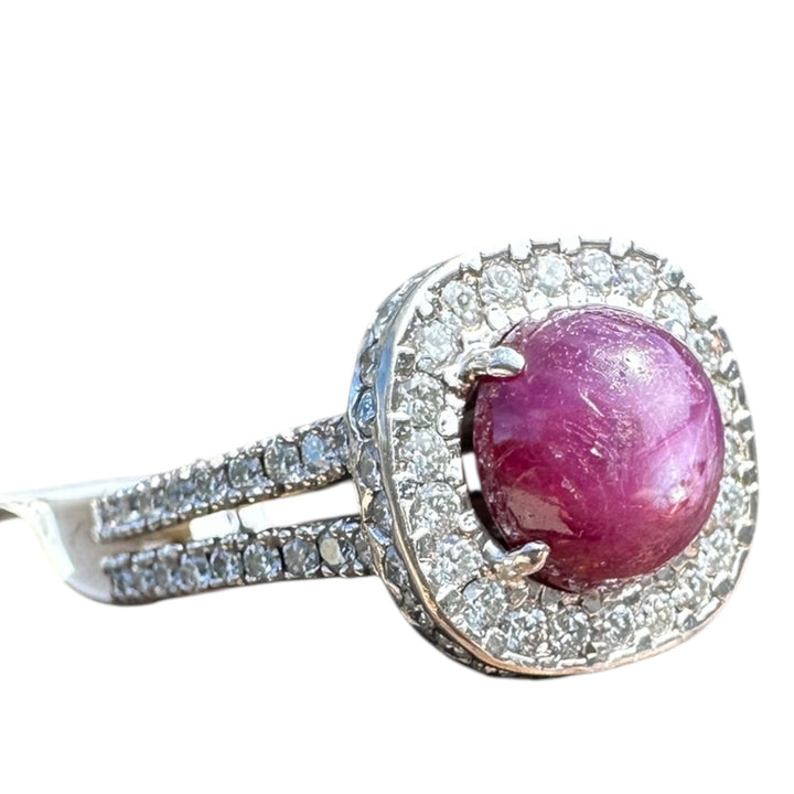 18 karat white gold star ruby halo diamond ring