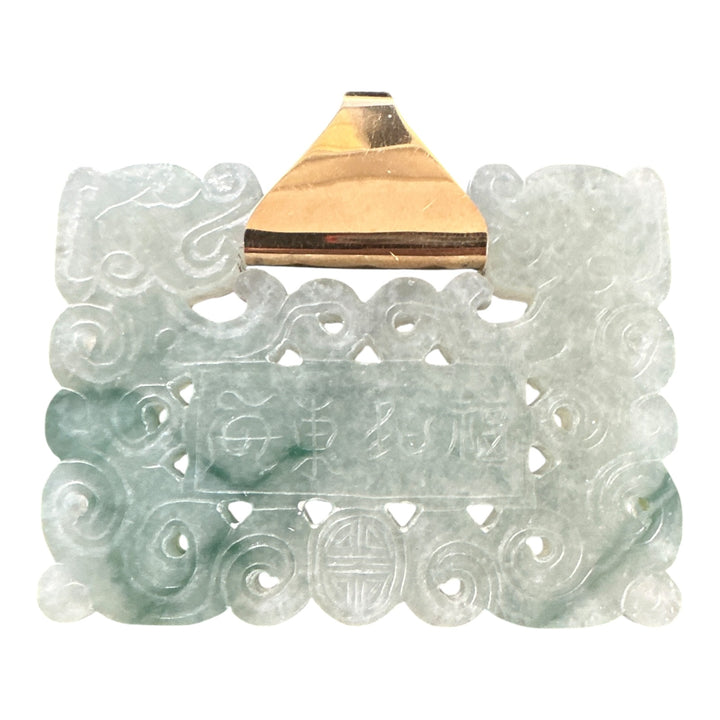 ￼ Lucky 14 karat 91.54 g carved green Jadeite pendant
