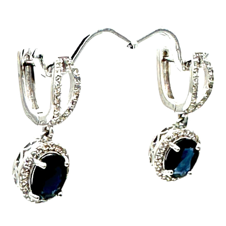 14 karat white gold, diamond halo 3.50 Ct blue stone earrings