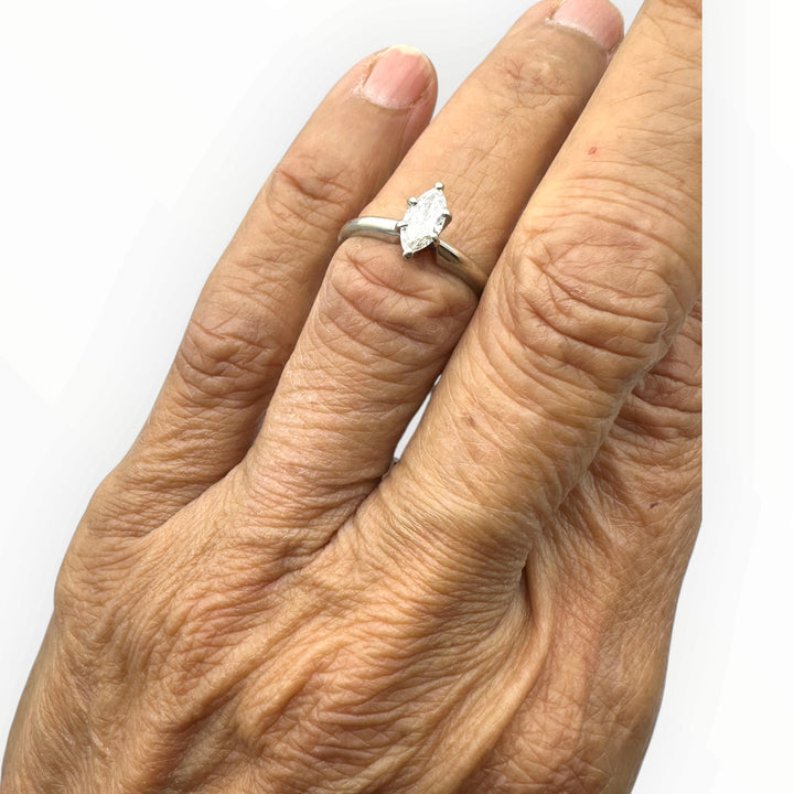 Classic .41 carat marquise–shaped diamond solitaire ring in 14 karat white gold