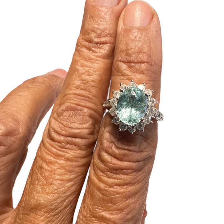 14 karat white gold neon 4.50 Carat Paraiba Tourmaline halo diamond ring