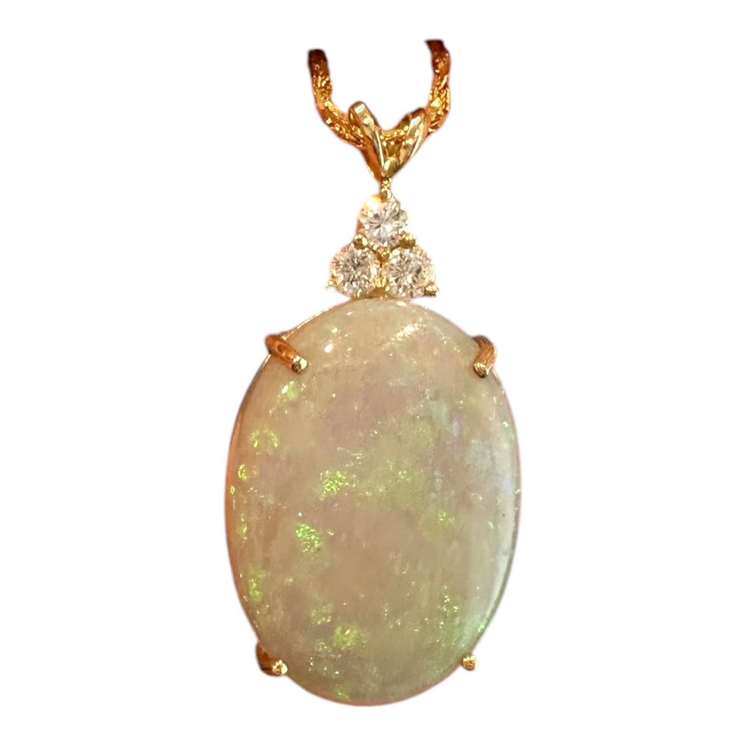 14 karat pendant with 15 karat, Australian opal and diamonds