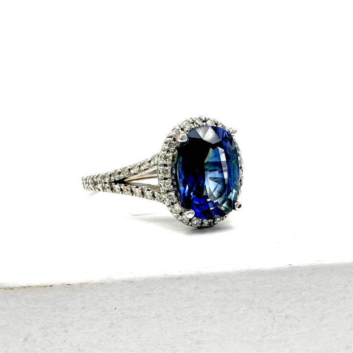 14 Karat Halo Diamond 2.60 Carat Oval Blue Sapphire Ring