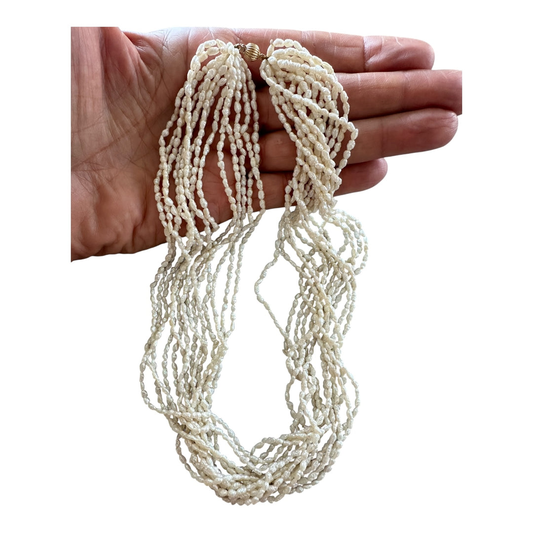 14 karat yellow gold multi strand 18 inch pearl necklace
