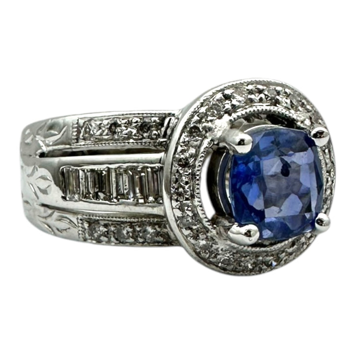 14 Karat White Gold 2.25TCW Blue Sapphire Halo Diamond and Baguette Ring
