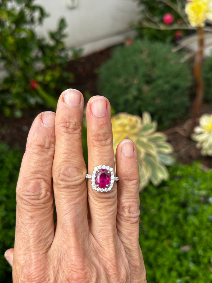18 karat white gold, 6 carat pink tourmaline and diamond halo ring