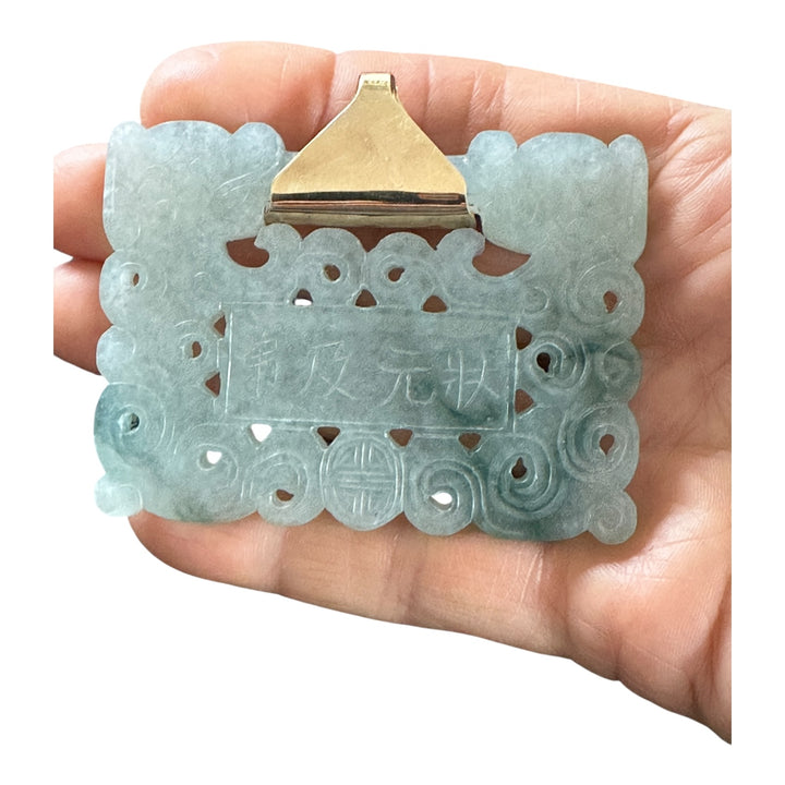 ￼ Lucky 14 karat 91.54 g carved green Jadeite pendant