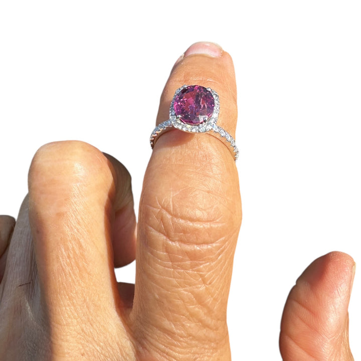 14 karat, 2 carat purple Tourmaline and diamond halo ring