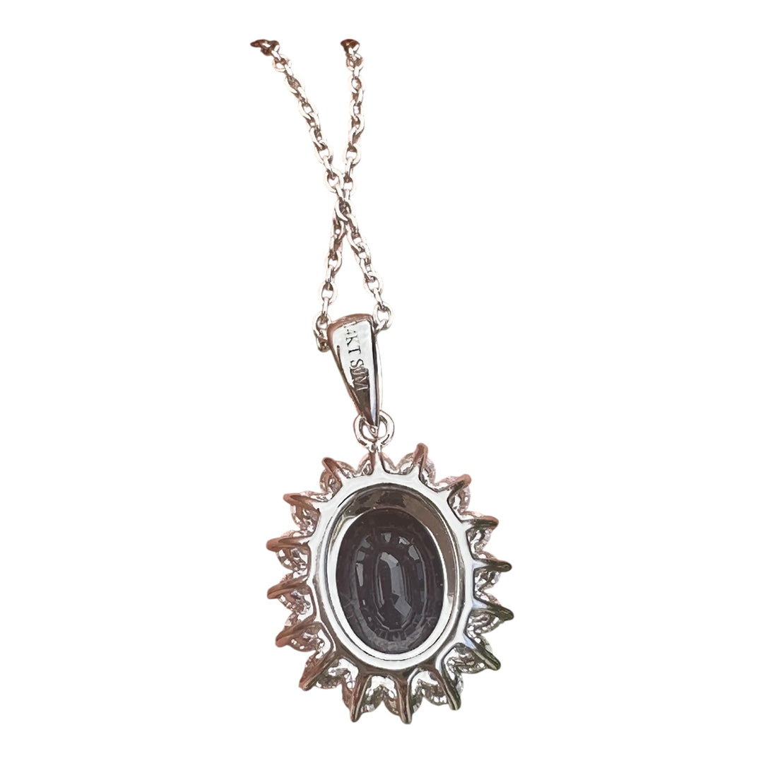 14 karat white gold 2.90 carat sapphire and Diamond Halo, pendant, and chain ￼