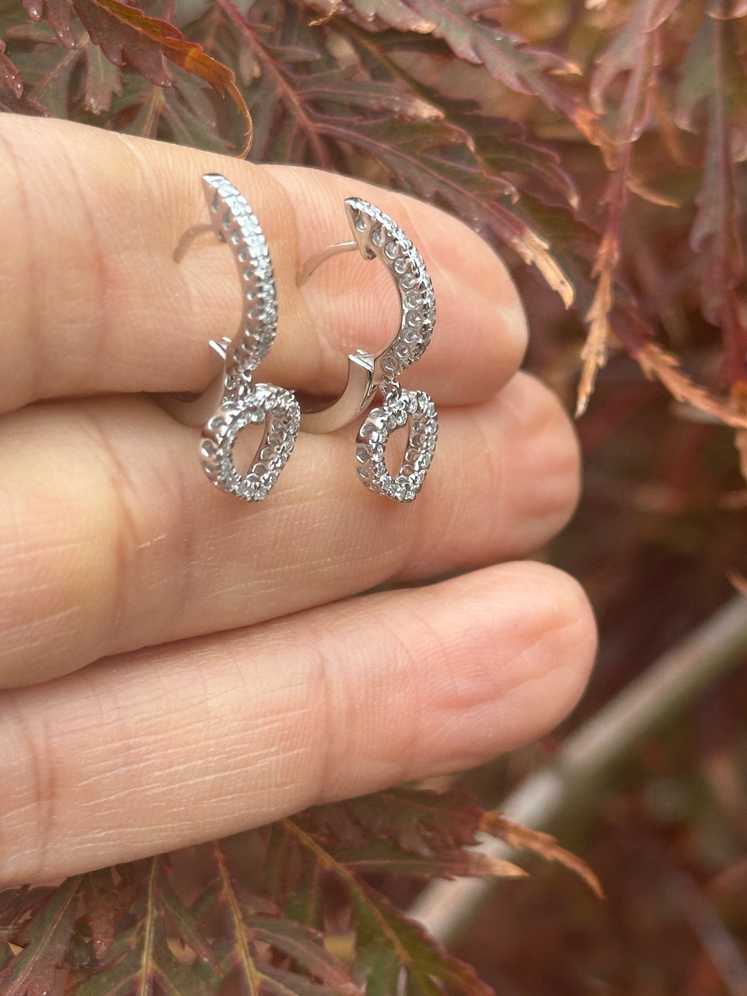 14 karat white gold Heart huggy earrings, .90 carat diamonds