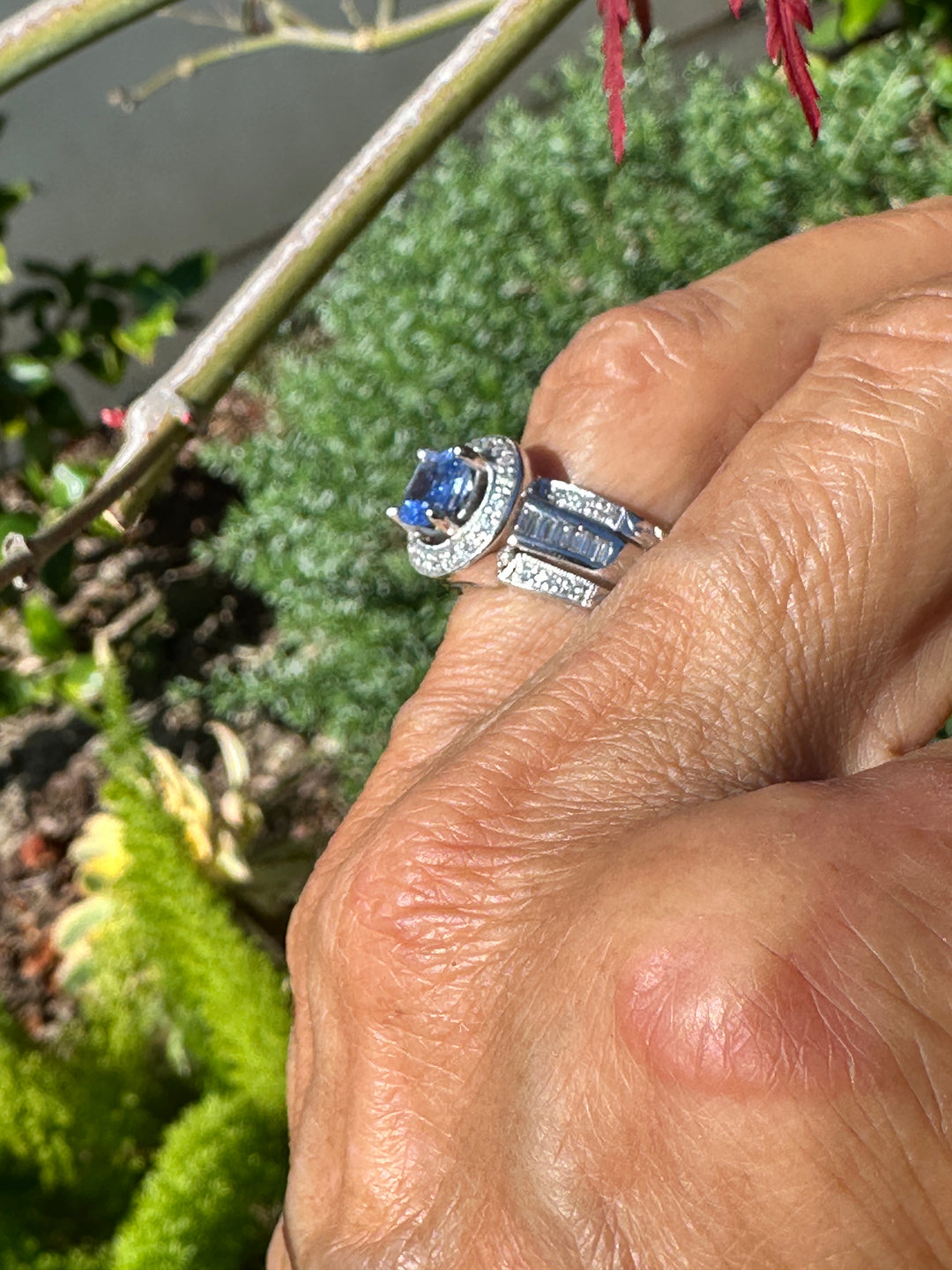 14 Karat White Gold 2.25TCW Blue Sapphire Halo Diamond and Baguette Ring
