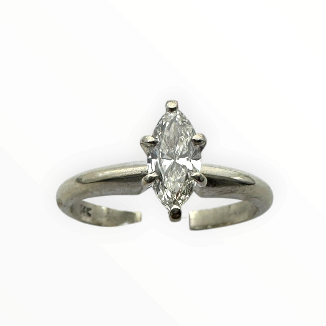 Classic .41 carat marquise–shaped diamond solitaire ring in 14 karat white gold