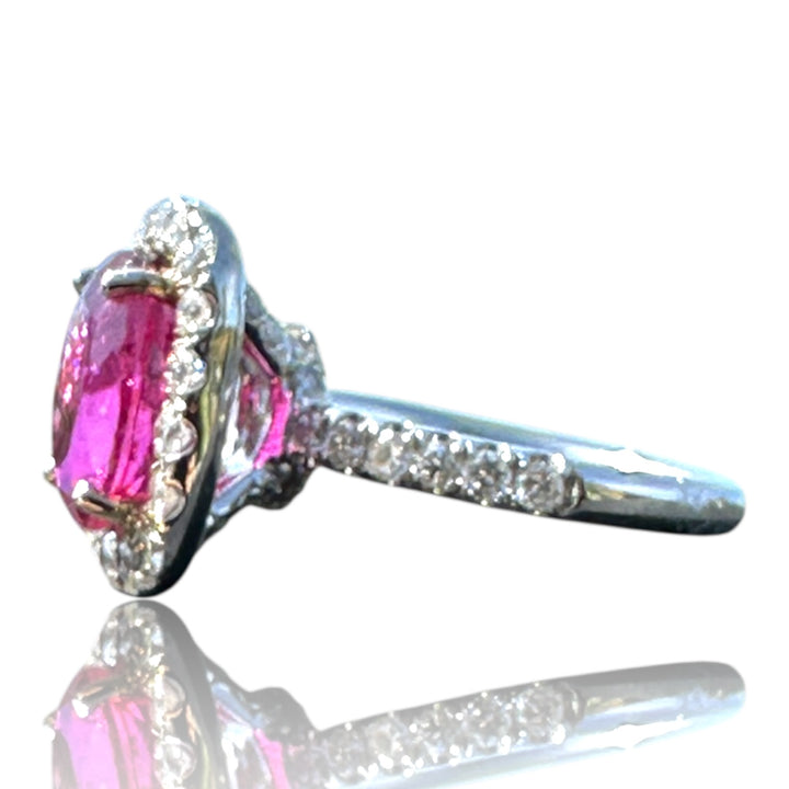 18 karat white gold, 6 carat pink tourmaline and diamond halo ring