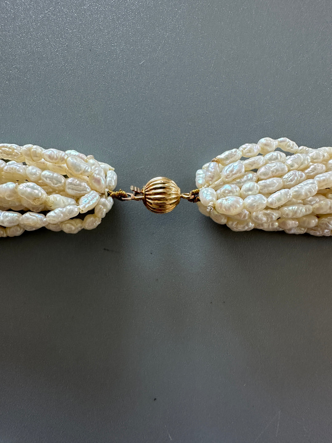 14 karat yellow gold multi strand 18 inch pearl necklace
