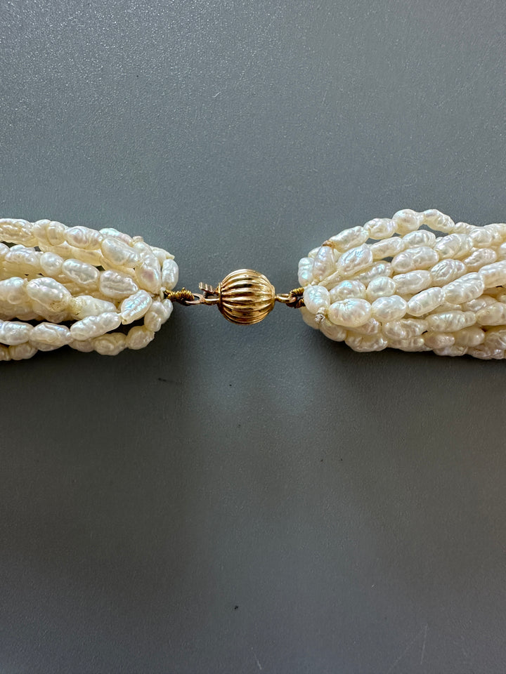 14 karat yellow gold multi strand 18 inch pearl necklace