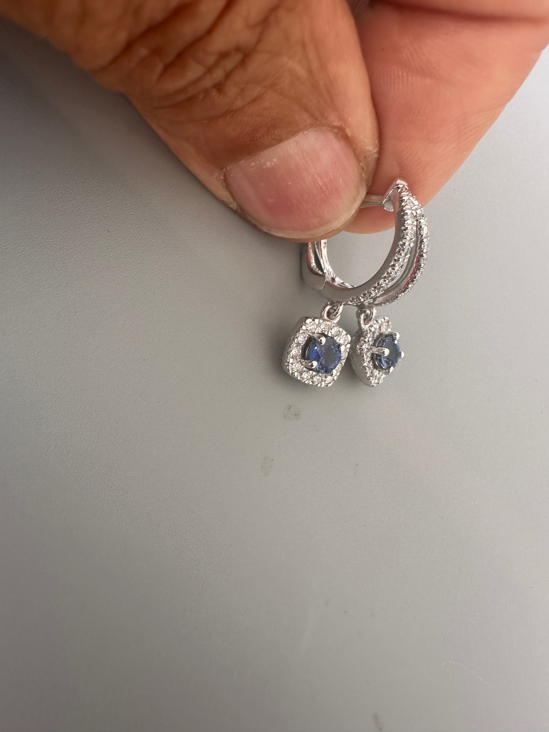 14 karat 2.00 carat sapphire, and diamond halo huggy earrings