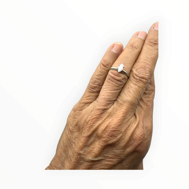 Classic .41 carat marquise–shaped diamond solitaire ring in 14 karat white gold