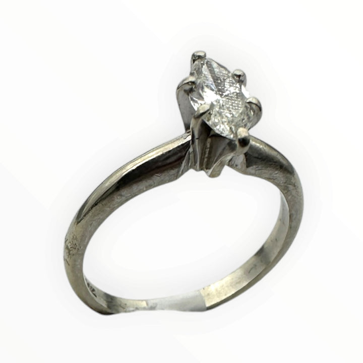 Classic .41 carat marquise–shaped diamond solitaire ring in 14 karat white gold