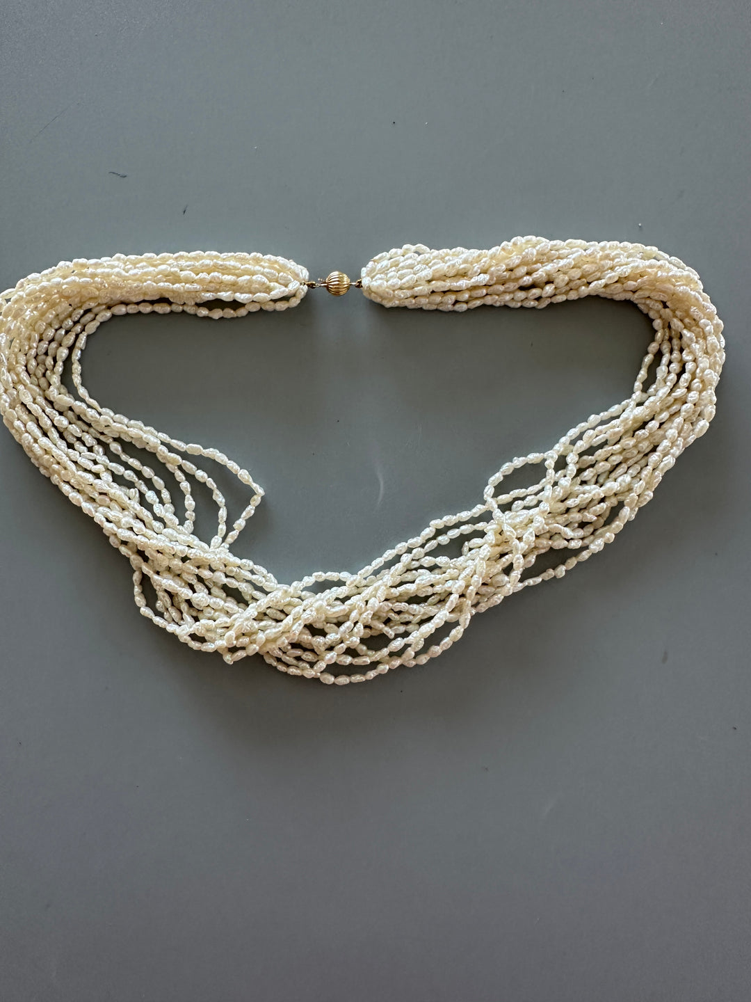14 karat yellow gold multi strand 18 inch pearl necklace