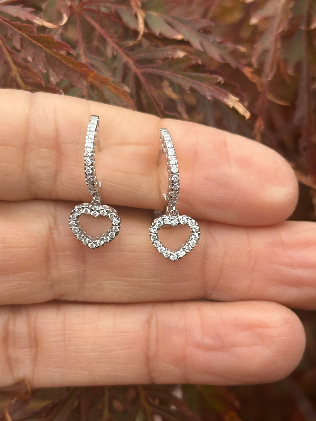 14 karat white gold Heart huggy earrings, .90 carat diamonds