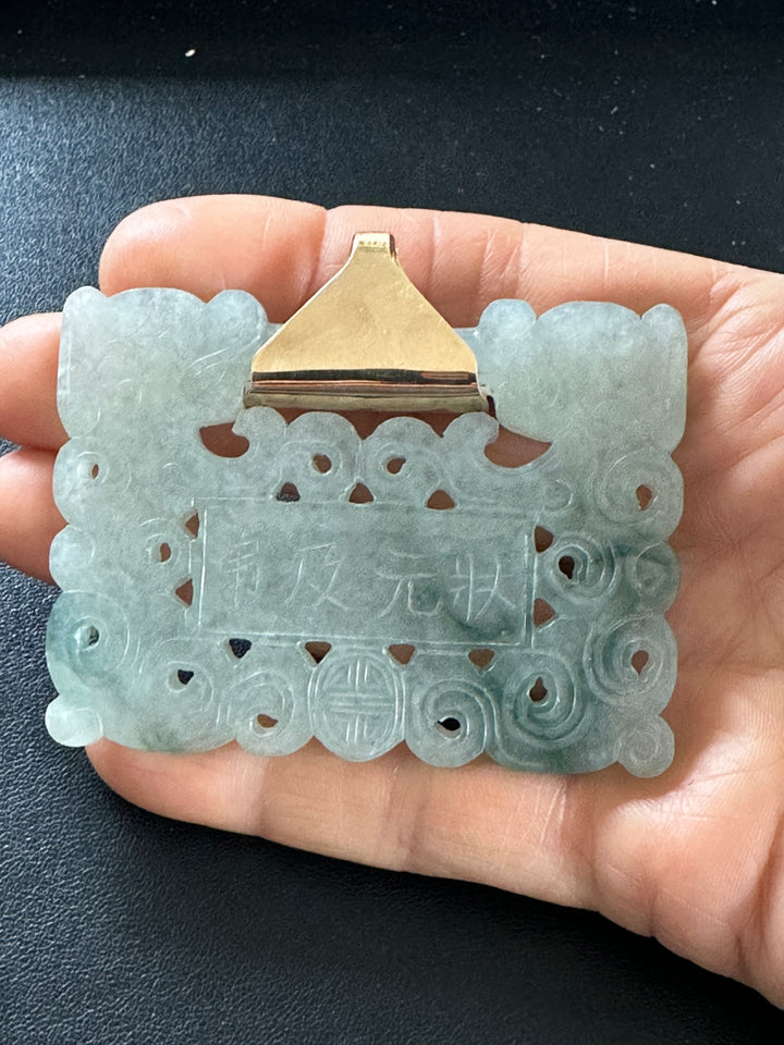 ￼ Lucky 14 karat 91.54 g carved green Jadeite pendant