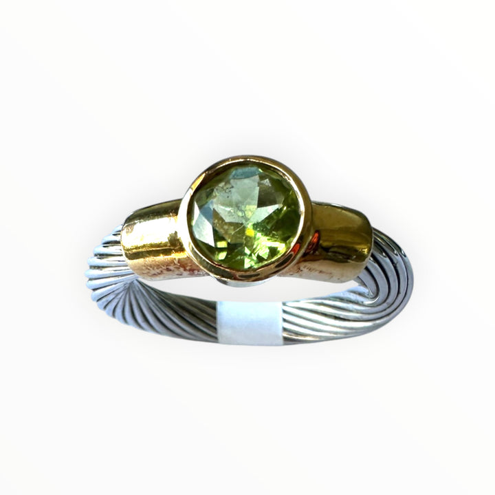 14 karat yellow gold cable ring with brilliant 1.00 carat green peridot gemstone