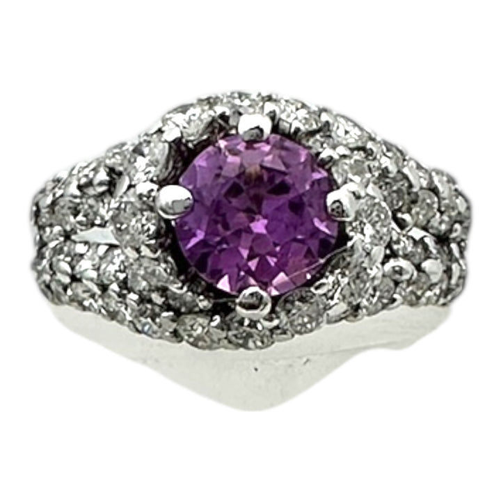 ￼ 14 karat white gold, pink, sapphire, and diamond Paved halo split shank ring
