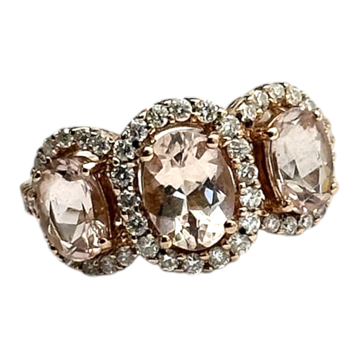 14 karat pink gold, 3-stone Morganite diamond halo ring