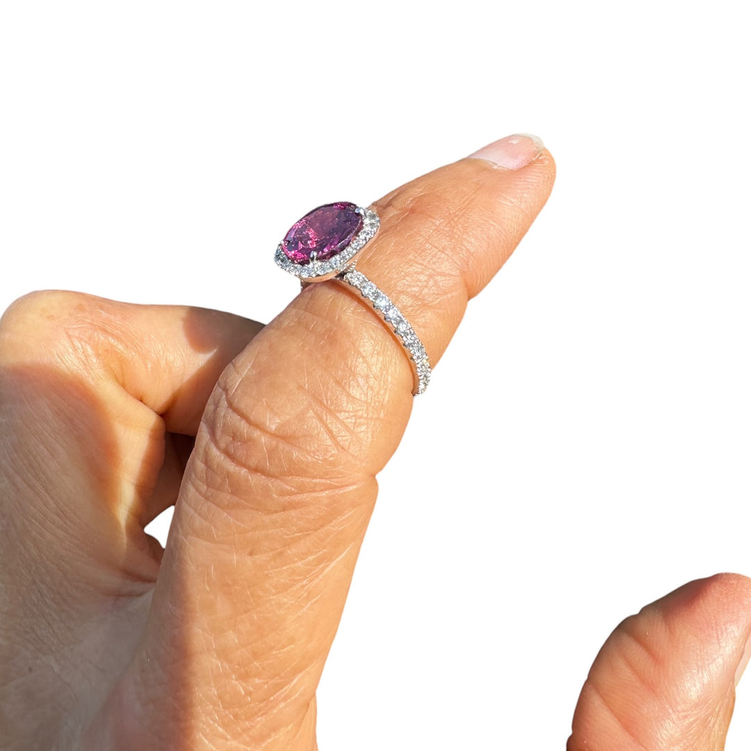 14 karat, 2 carat purple Tourmaline and diamond halo ring