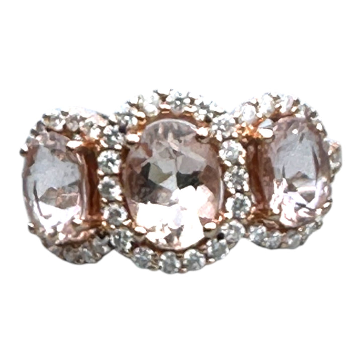 14 karat pink gold, 3-stone Morganite diamond halo ring