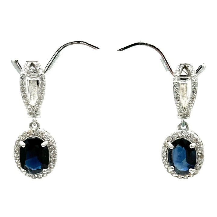 14 karat white gold, diamond halo 3.50 Ct blue stone earrings