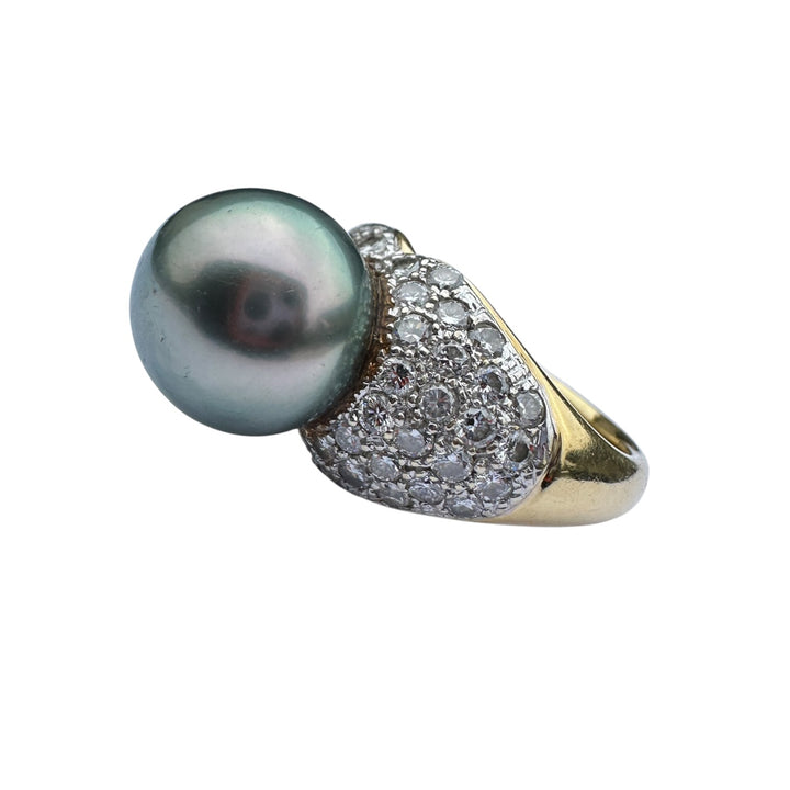 Mid-century, 18 karat Tahitian 12 mm pearl with 1.50 carat diamonds