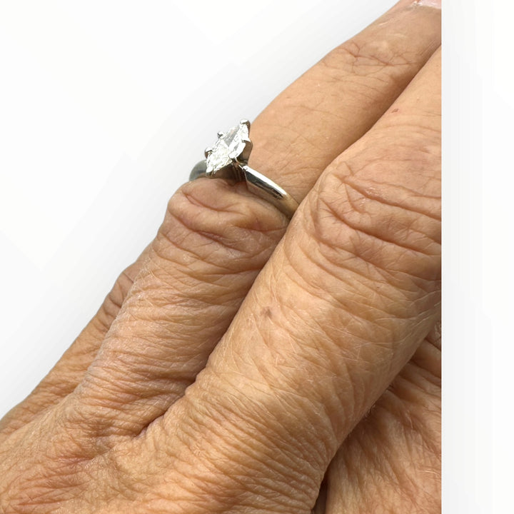 Classic .41 carat marquise–shaped diamond solitaire ring in 14 karat white gold