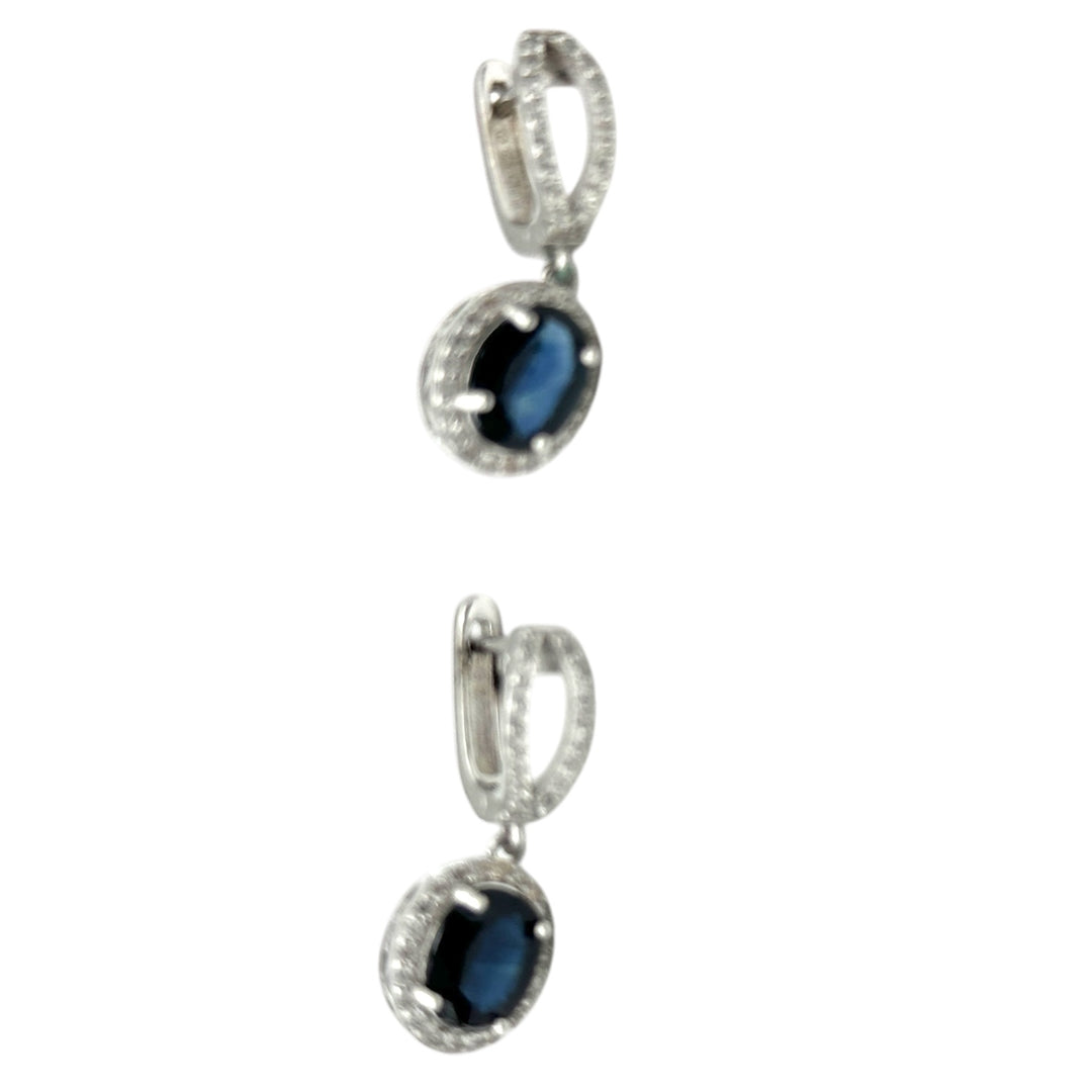 14 karat white gold, diamond halo 3.50 Ct blue stone earrings