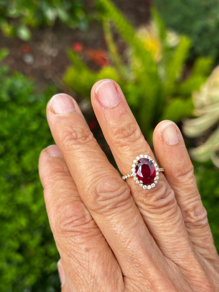 14 karat 3.93 carat red ruby halo ring