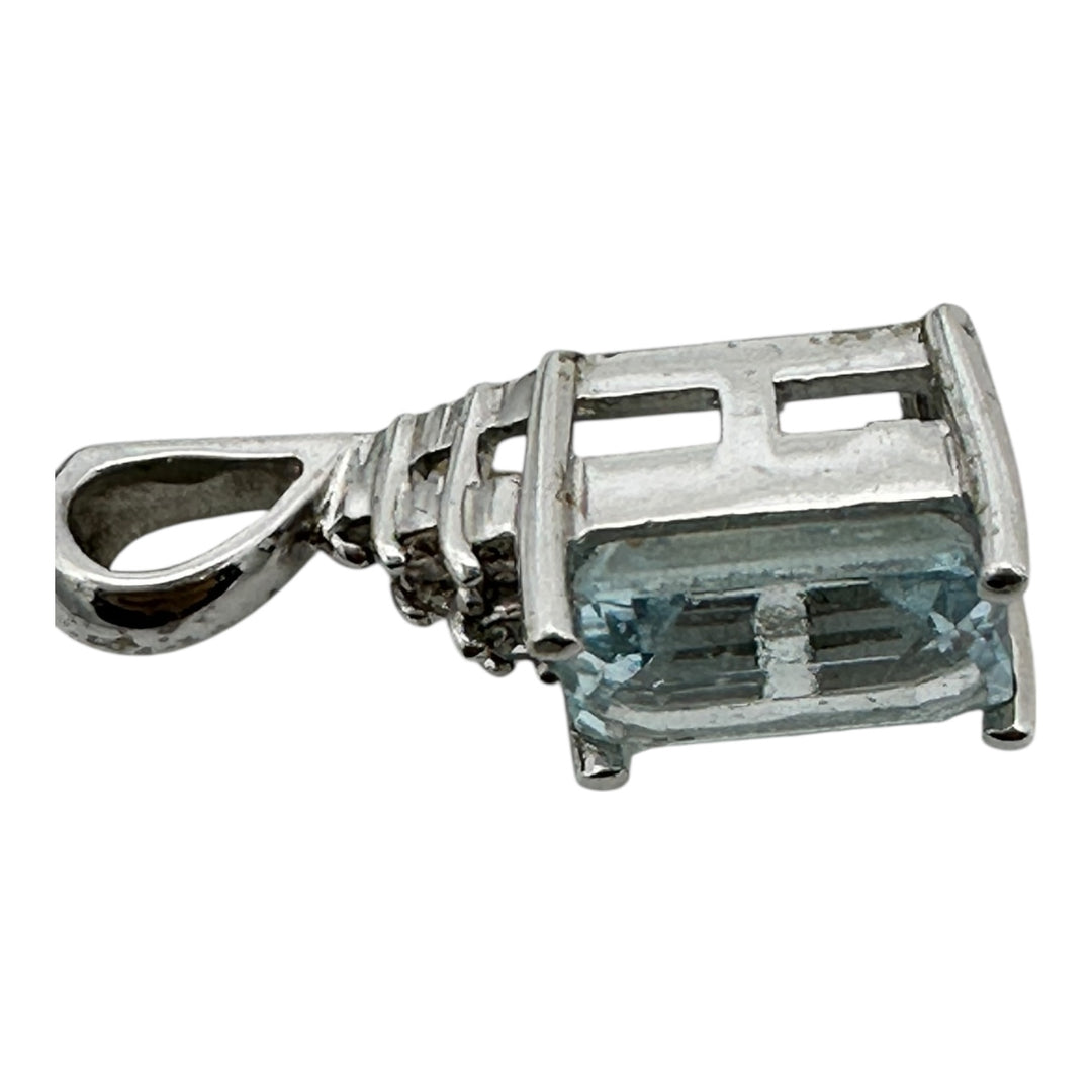 14 karat white gold, aquamarine, diamond pendant