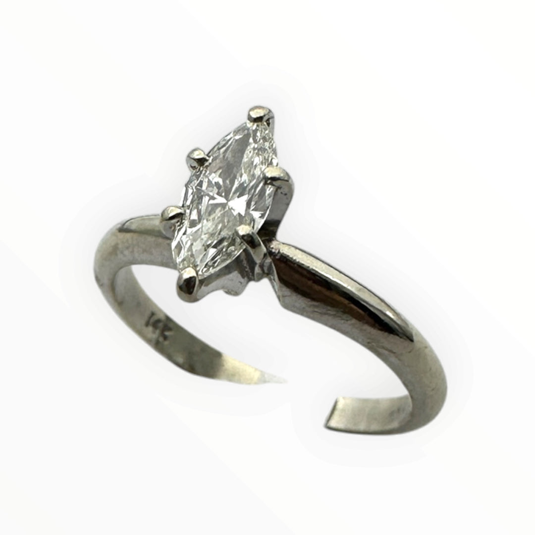 Classic .41 carat marquise–shaped diamond solitaire ring in 14 karat white gold