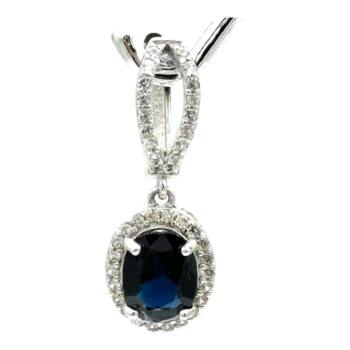 14 karat white gold, diamond halo 3.50 Ct blue stone earrings