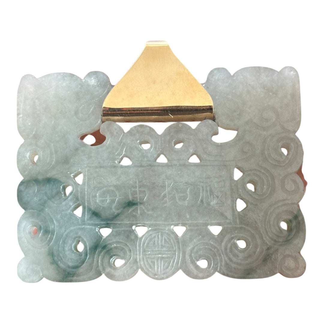 ￼ Lucky 14 karat 91.54 g carved green Jadeite pendant